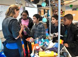  image of students working with science coach