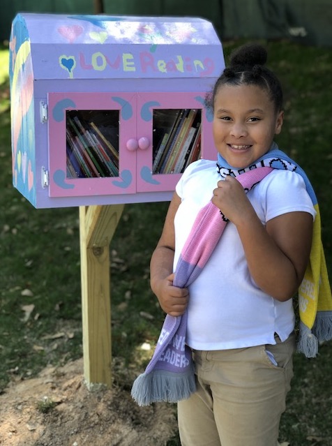 Hollis R.O.S.E. with free library 