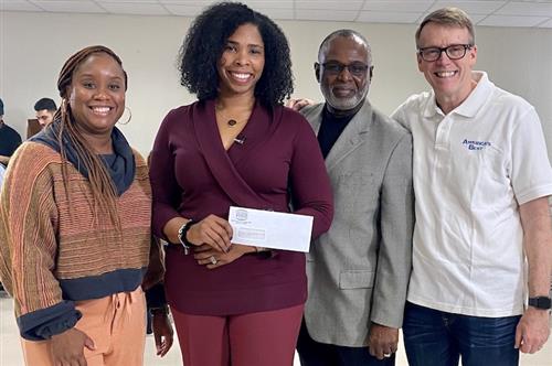 National Vision gives $5,000 to Hollis Innovation Academy 