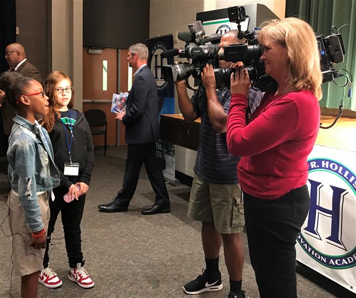 Hollis Innovation Academy students being interviewed by WSBTV and WXIA 