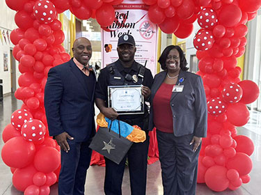  Officer Ellis receiving an award